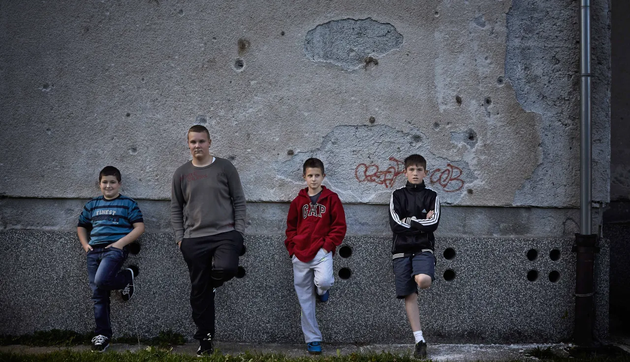 Portrait of four children who were injured by an abandoned unexploded device.