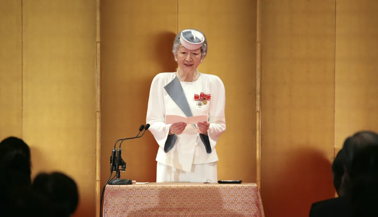 Her Majesty Empress Michiko delivers a congratulatory address to Saita, who is about to receive the Florence Nightingale Award, in Japan.