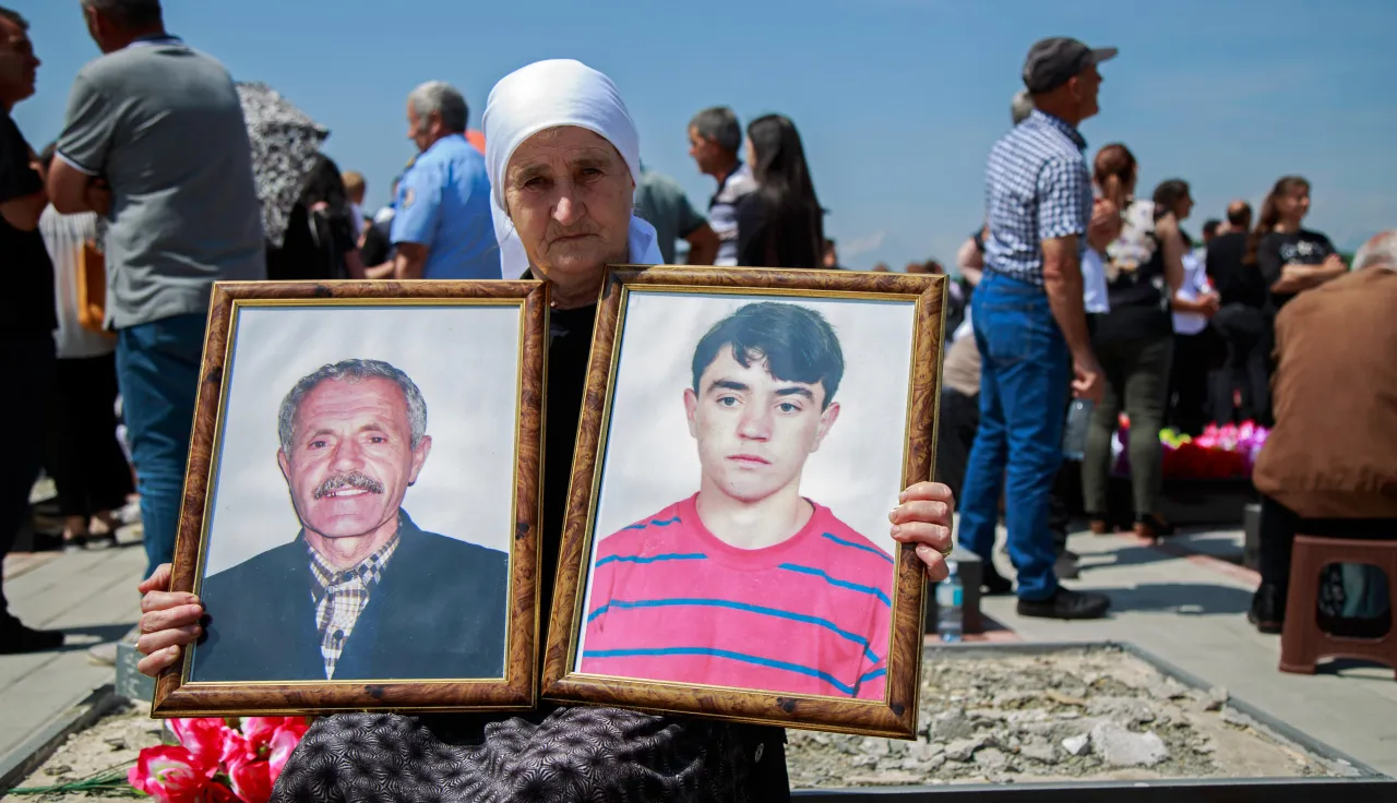 People gather to mark the National Day of Missing persons in Gjakovë/Djakovica, Kosovo.