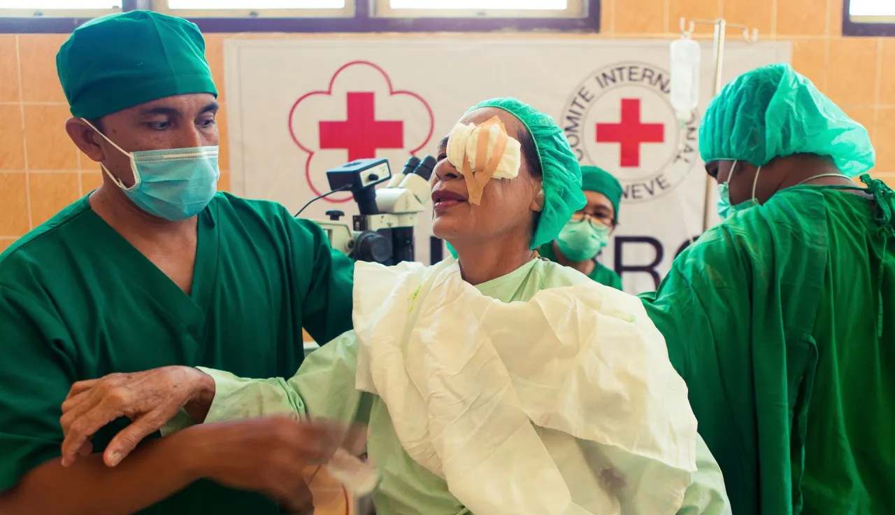 A patient who just finished her cataract surgery prepares to be taken to the recovery room in Maluku, Buru.