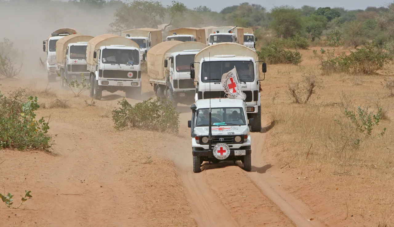 In Sudan, 2006, an ICRC convoy travels between Gereida and Al Fasher.
