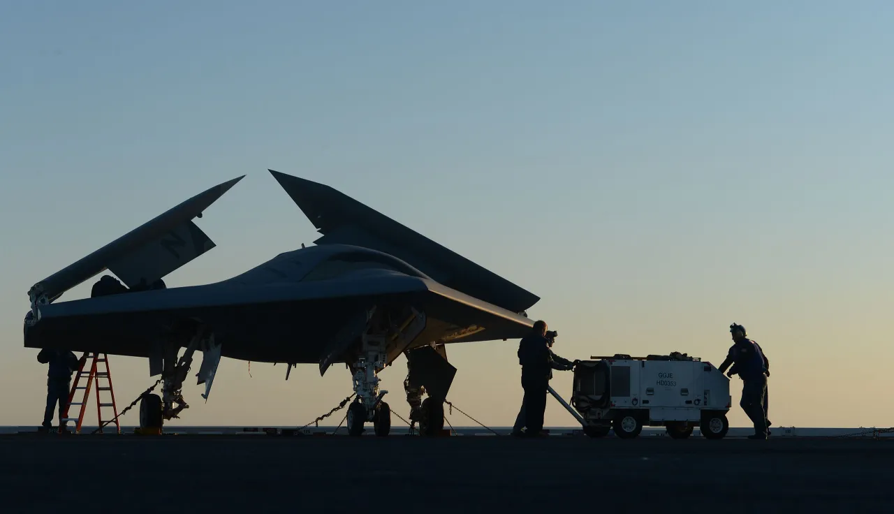 Northrop Grumman personnel conduct preoperational tests on a U.S. Navy X-47B Unmanned Combat Air System demonstrator aircraft.