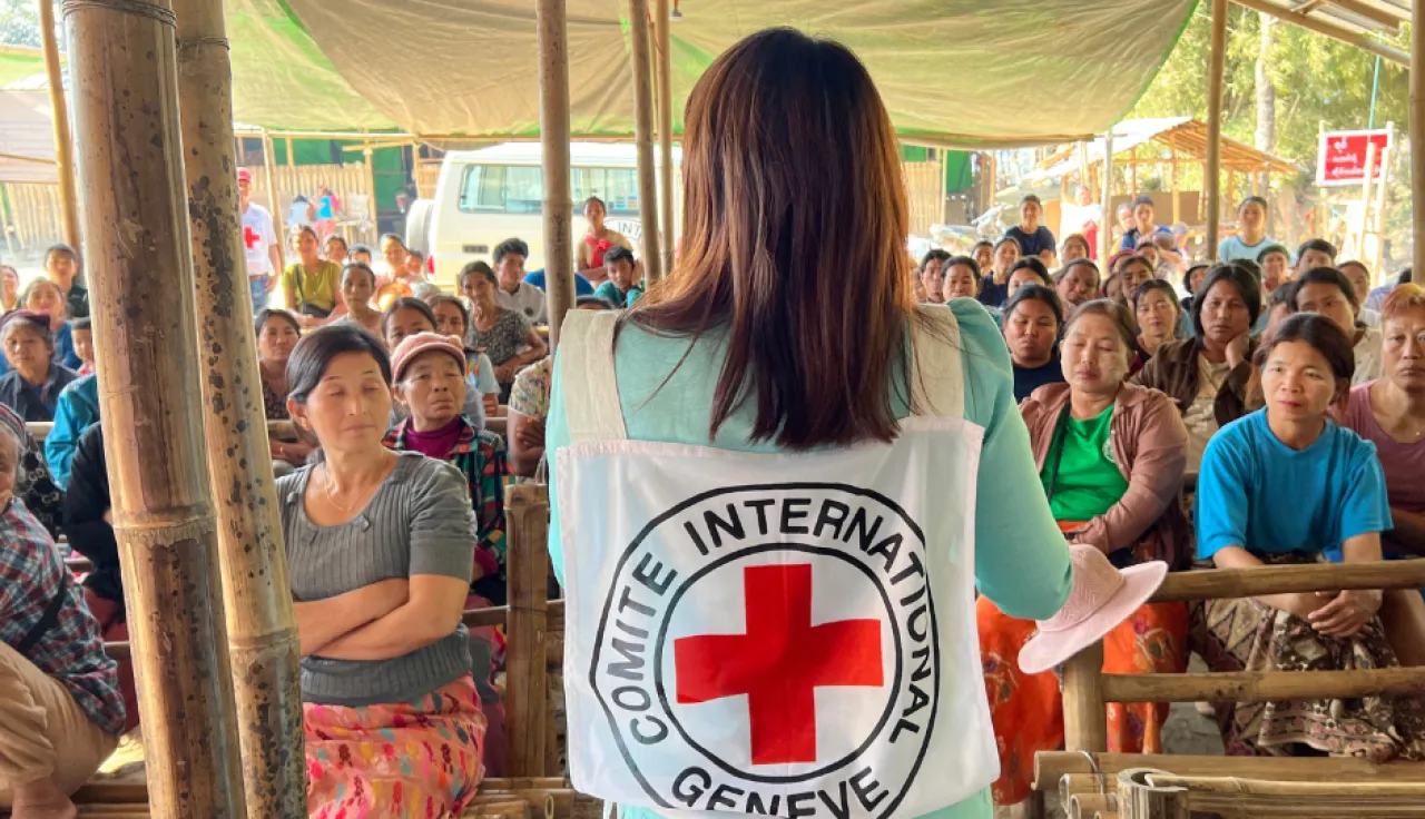 An ICRC staff members conducts a landmine risk education session for Myanmar community members as the country recovers from a massive earthquake. An ICRC staff members conducts a landmine risk education session for Myanmar community members as the country recovers from a massive earthquake.