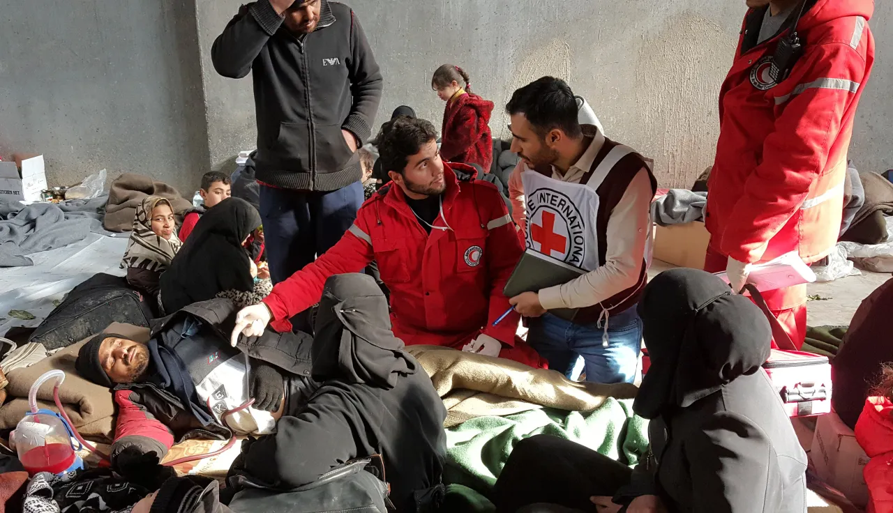 The ICRC and the Syrian Arab Red Crescent assess the needs of people who gathered in collective shelters after fleeing fighting in the region of Aleppo, Syria (2016). The ICRC and the Syrian Arab Red Crescent assess the needs of people who gathered in collective shelters after fleeing fighting in the region of Aleppo, Syria (2016).