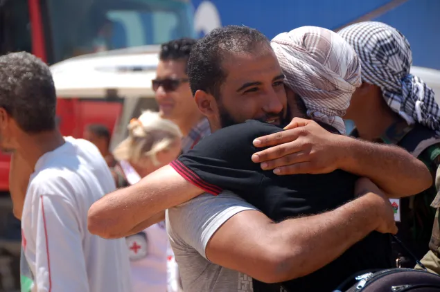 Libya, Benghazi, harbour. A family is reunited. People separated from their families by the conflict were brought from Tripoli to Benghazi by an ICRC-chartered vessel.