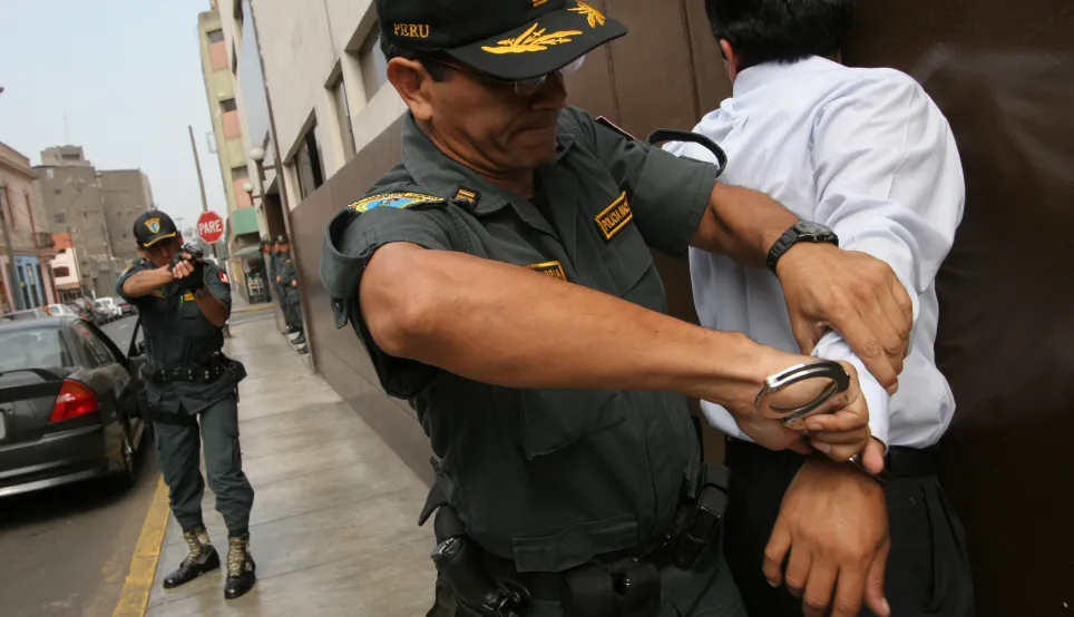 In Lima, Peru, a training exercise on the use of force and human rights includes a simulation of a suspect's street arrest.