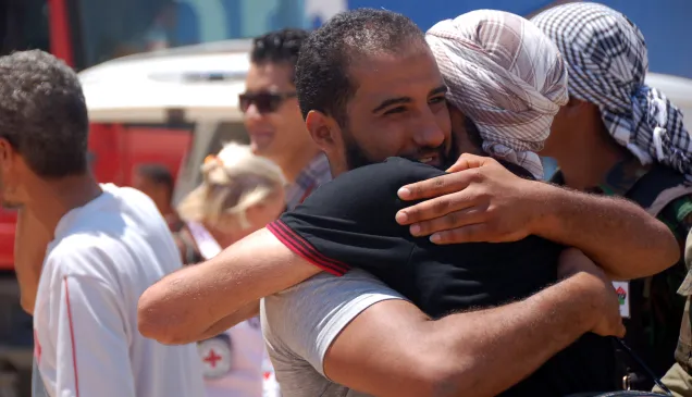 Libya, Benghazi, harbour. A family is reunited. People separated from their families by the conflict were brought from Tripoli to Benghazi by an ICRC-chartered vessel.
