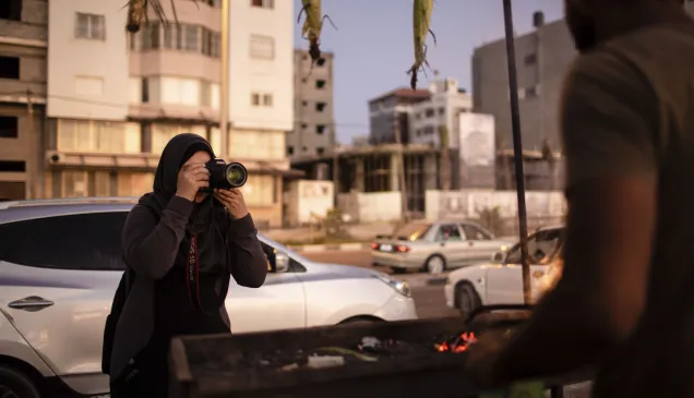 Samar Ab El-Ouf, a Palestinian freelance photojournalist, at work in the Gaza Strip