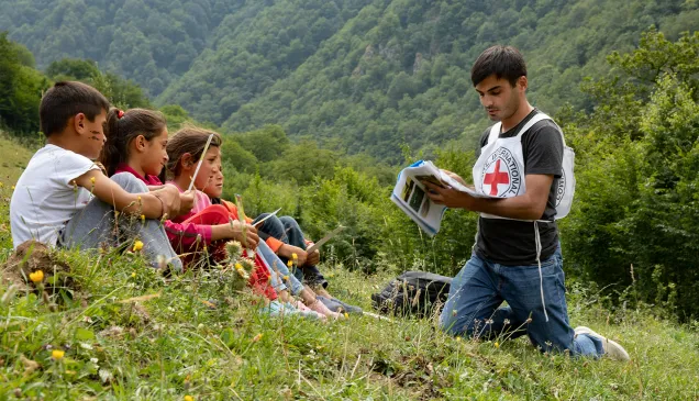 ICRC staff member is raising awareness on the dangers of mines and explosive remnants of war.