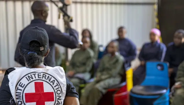 IHL  Law Students from a Kenyan University listen to an firearms instructer during an IHL War simulation in Nairobi, Kenya