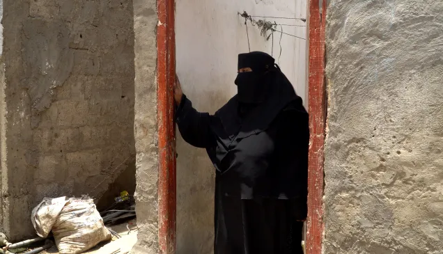 Arwaa_ Yemen Arwaa stands in the doorway