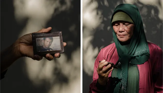 Gloria Berden holding her missing son's wallet Gloria Berden holding her missing son's wallet