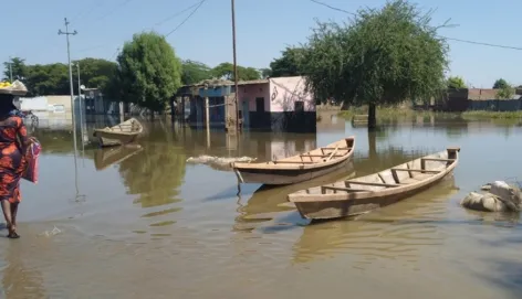 Residents using a canoe to go from one place to another