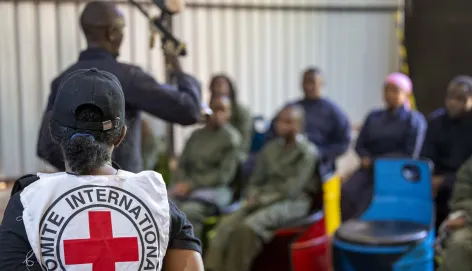 IHL  Law Students from a Kenyan University listen to an firearms instructer during an IHL War simulation in Nairobi, Kenya