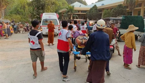 Myanmar response to the earthquake 2025 ICRC rescuers carry a wounded man on a stretcher in Myanmar following a devastating earthquake, as emergency relief efforts continue.