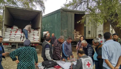 Agstafa district. With the support of the Azerbaijan Red Crescent Society, the ICRC staff of Barda Sub-Delegation distributes fertilizers to the residents of Tatli and Yaradullu villages to help increase harvesting.