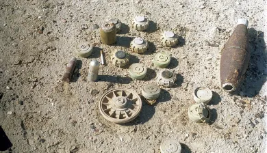 Various antipersonnel mines, 40mm grenade and part of mortar shell in Iraq.