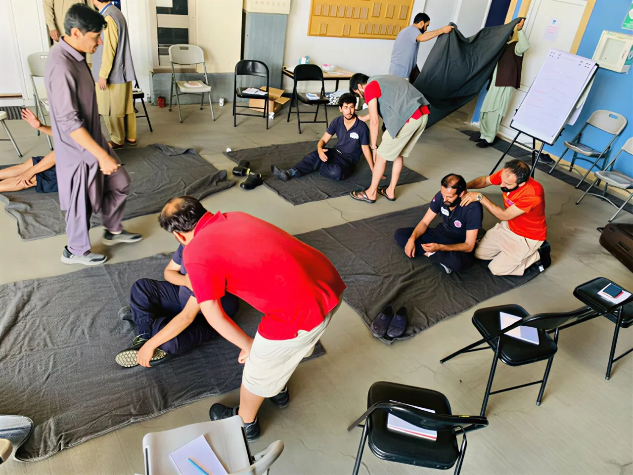 The ICRC staff during Advanced First-Aid Training (AFAT) for Kabul Airport’s fire extinguishing staff. The training aimed to strengthen their practical skills in providing immediate lifesaving assistance during operational duties and emergencies.