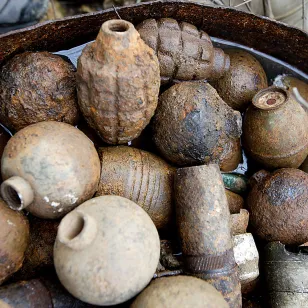 Container holding a range of grenades, submunitions and other recovered unexploded ordnance in Xieng Khouang, Phonsavan.