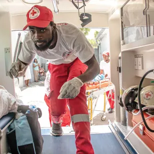 A doctor working as a volunteer at the Haitian Red-Cross