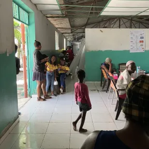 Patients sit in a waiting room at Port au Prince hospital