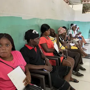 Patients sit in a waiting room at Port au Prince hospital