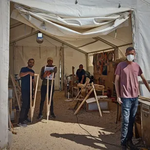 Hospital carpenters at the Red Cross Field Hospital. Hospital carpenters at the Red Cross Field Hospital.
