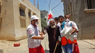 The ICRC works tirelessly with Red Cross and rec Crescent Societies to facilitate medical evacuations and provide medical supplies to hospitals in conflict zones around the world. Rama Humeid/ICRC