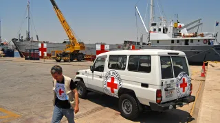 A ship used to transport relief aid from Cyprus to Lebanon in Larnaka harbour bears the red cross emblem.