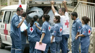 Loading of the Lebanese Red Cross minivan for the distribution of ICRC hygiene kits and blankets,