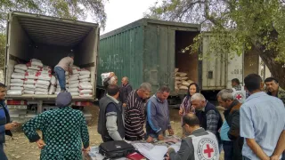 Agstafa district. With the support of the Azerbaijan Red Crescent Society, the ICRC staff of Barda Sub-Delegation distributes fertilizers to the residents of Tatli and Yaradullu villages to help increase harvesting.
