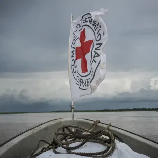 The ICRC flag whips in the wind on the river Nile.