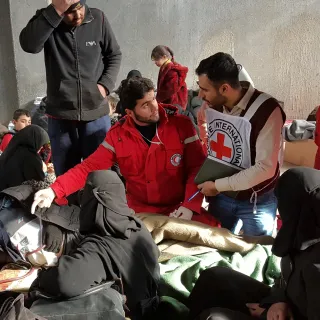 The ICRC and the Syrian Arab Red Crescent assess the needs of people who gathered in collective shelters after fleeing fighting in the region of Aleppo, Syria (2016). The ICRC and the Syrian Arab Red Crescent assess the needs of people who gathered in collective shelters after fleeing fighting in the region of Aleppo, Syria (2016).