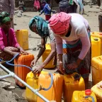 The ICRC reduces suffering by providing clean water, shelter, and essential services, ensuring people affected by armed conflict can live safely.