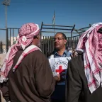 In eastern Jordan, Mafraq, an ICRC employee tells Syrian refugees about the services available to re-establish contact with relatives in Syria and elsewhere. Didier REVOL/ICRC In eastern Jordan, Mafraq, an ICRC employee tells Syrian refugees about the services available to re-establish contact with relatives.