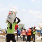 ICRC staff supplying essential items to refugees.