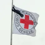 ICRC flag with black ribbon attached