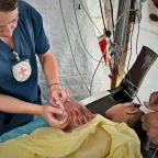 ICRC phsyiotherapist, Rieke Hayes, with a patient at the Red Cross Field Hospital in Rafah ICRC phsyiotherapist, Rieke Hayes, with a patient at the Red Cross Field Hospital in Rafah