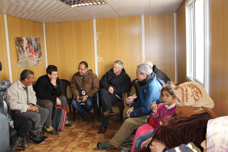 ICRC office, Zaatari refugee camp, Jordan.  CSG members talk to Syrian refugees.