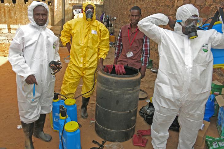 Sikasso prison, Mali. Technical staff get the equipment and disinfectant ready.