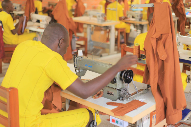 inmates engaging in tailoring uniform part of their rehabilitation in kitalya prisoners uganda